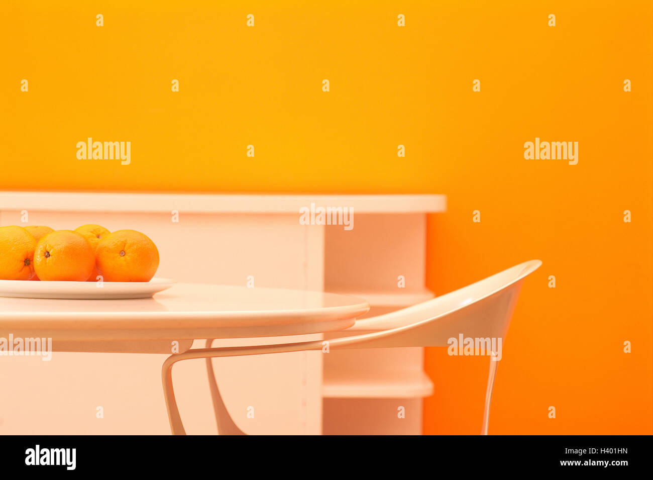 Room, chair, table, oranges, Sideboard, detail, room, living space, wall orange, St. furniture white, setup, modern, sterilely, dining table, plate, fruit plate, fruits, fruit, oranges, citrus fruits, conception, inside Stock Photo