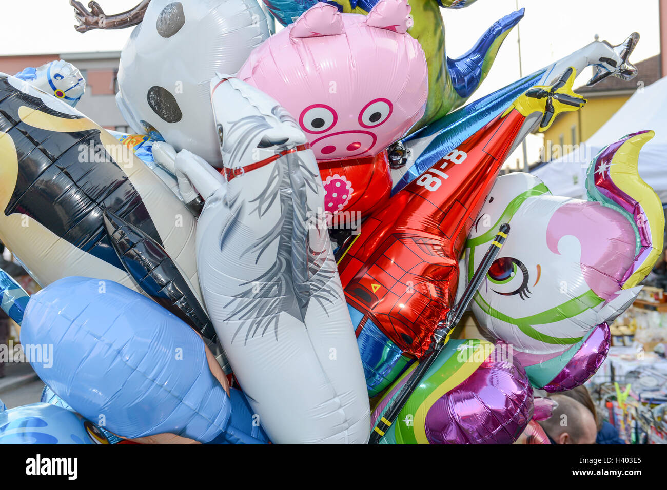 Colorful inflated balloons selling at a market Stock Photo Alamy