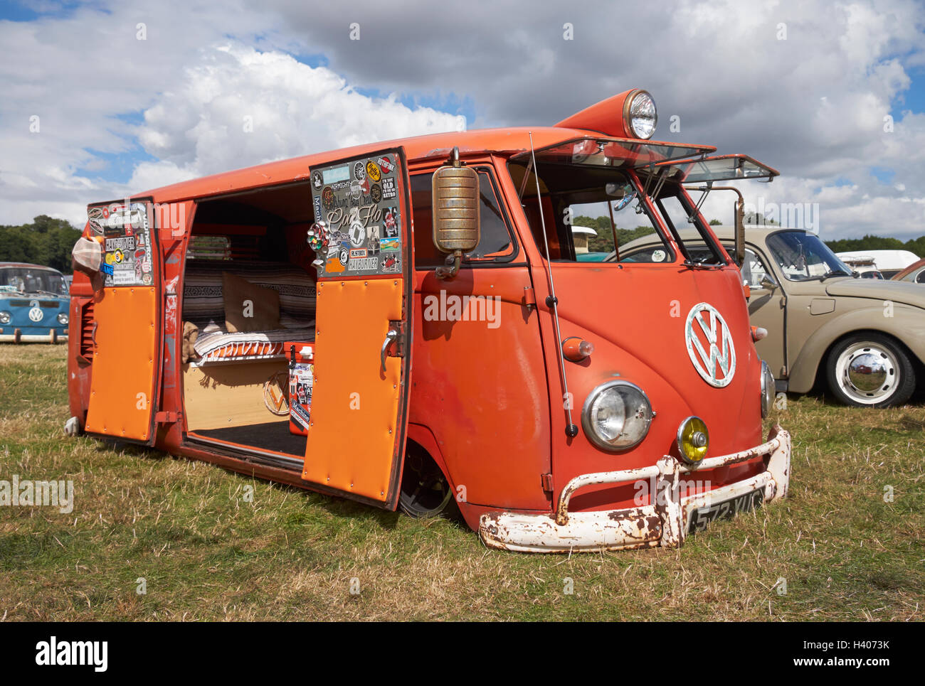 A lowered splitscreen VW van with open 'barn doors' at the Viva Skeg
