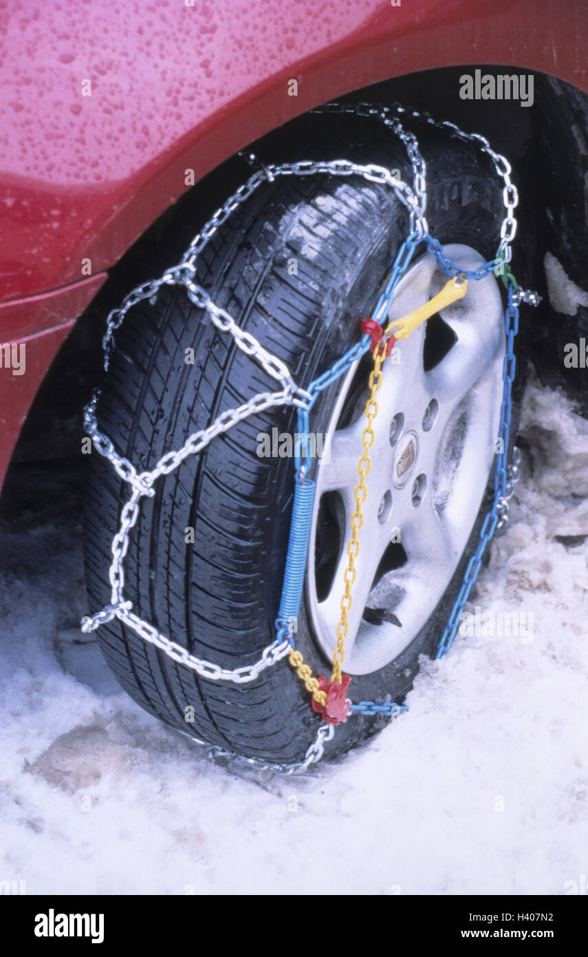 Snow, automobile tyre, non-skid chains, detail, car, passenger car, tyre, front wheel, winter tyre, non-skid chain, slide danger, street security, security, catena duty, street smoothness, protection, precaution, accident prevention, season, winter, wintr Stock Photo