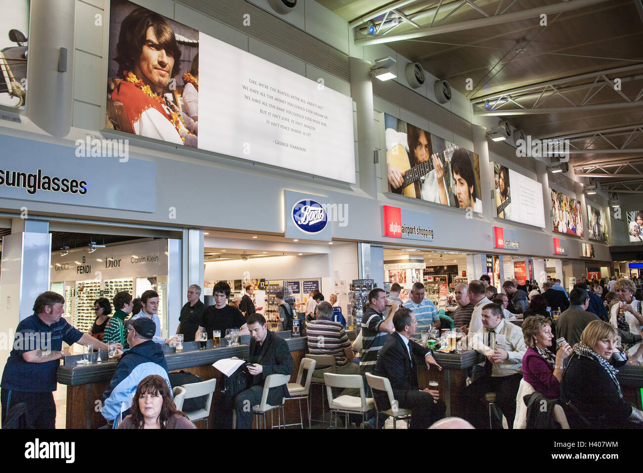 Passengers,drinking,alcohol,beer,wine,booze,At, Departure, Lounge, at, Liverpool John Lennon, Airport,Liverpool,England. Stock Photo