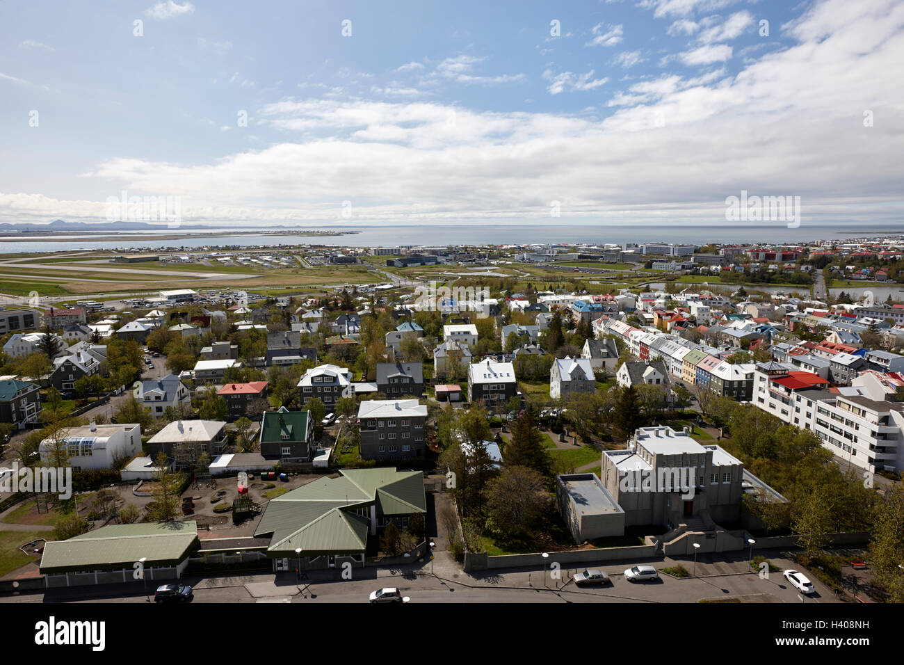 aerial view over the western side and airport city of reykjavik Iceland Stock Photo