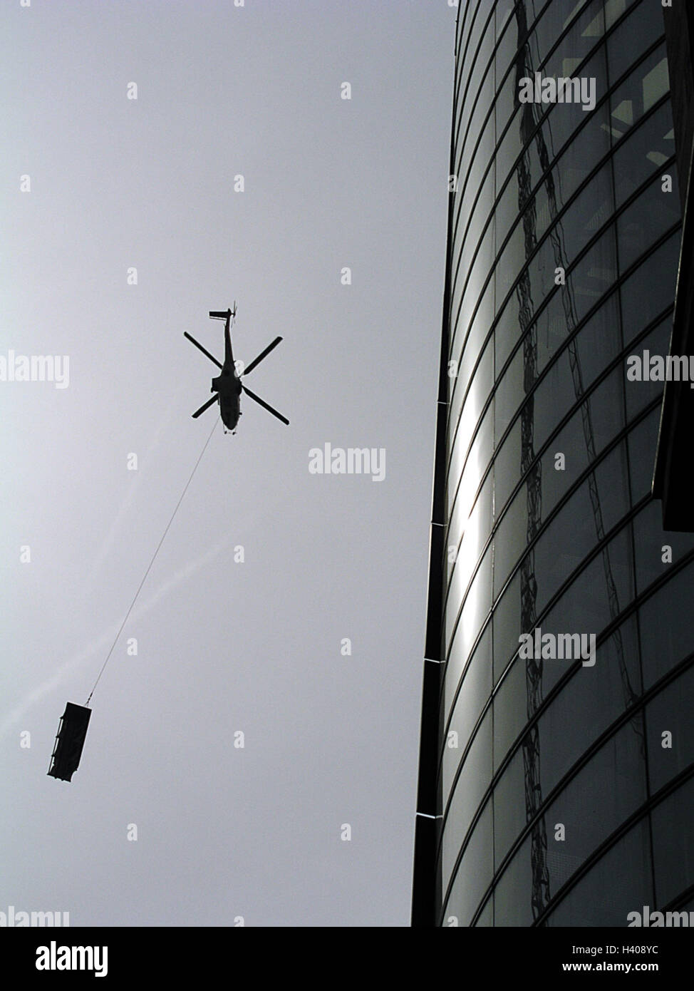 Picture of Silhouette, high rise, facade, costs helicopter, from below, skyscraper ...