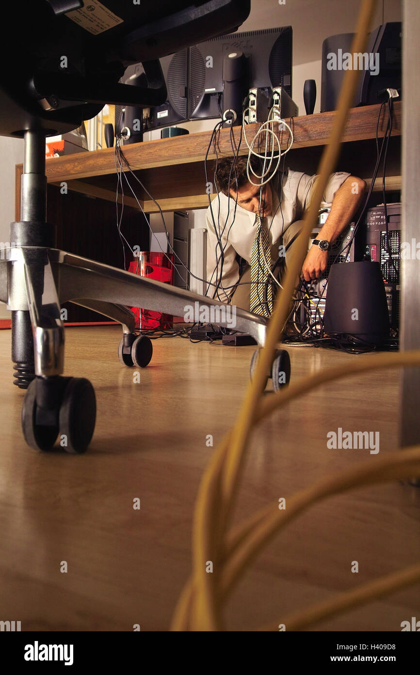 Office, desk, computer, man, kneel, check connections, cables, workplace, table, PC, monitor