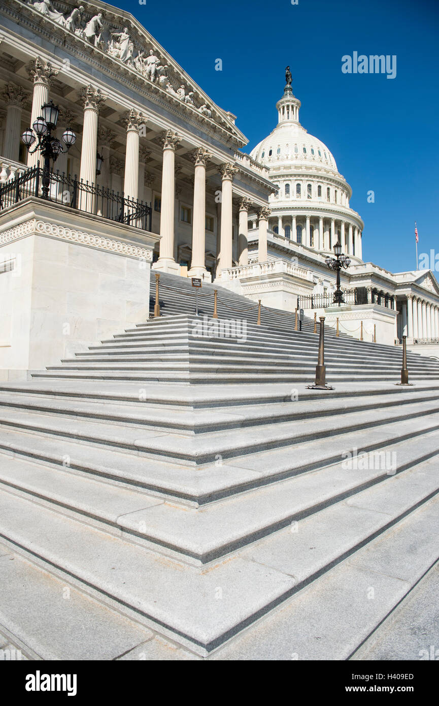 The United States Capitol building dome topped by the Statue of Freedom ...