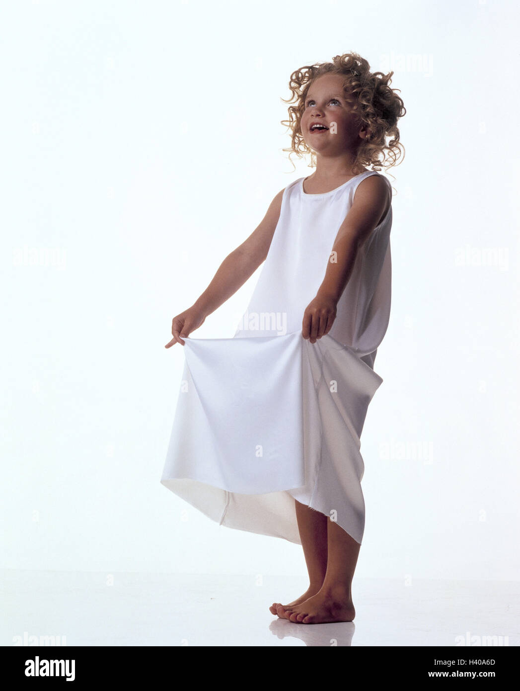 Star-Money, girls, nightdress, detain children, studio, cut out, child, 5 - 8 years, dress, white, view up, high-level sight, catch, expectation, expectantly, hope, wealth, fairy tale, childishly, naively Stock Photo