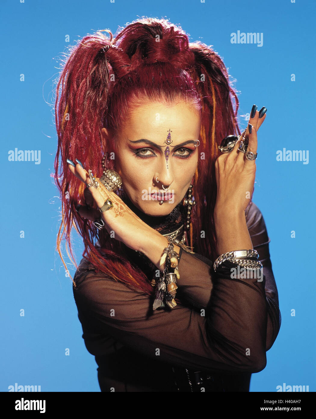 Punk, Piercings, Bindi, costume jewellery, gesture, half portrait, woman,  young, hairs, red, long, make-up, Piercing, punk, body jewellery, jewellery,  nasal rings, trend, studio, cut out Stock Photo - Alamy