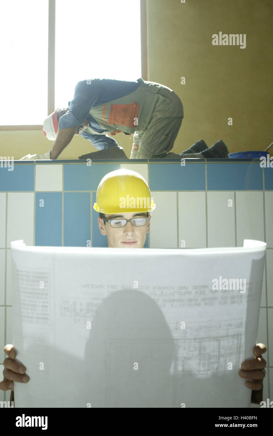 Men at work, swimming-pool, architect, construction helmet, plan, control, background, tiler construction, man, 20-30 years, occupation, work, structural engineer, developer, site manager, architect's plan, construction supervision, acceptance work, const Stock Photo