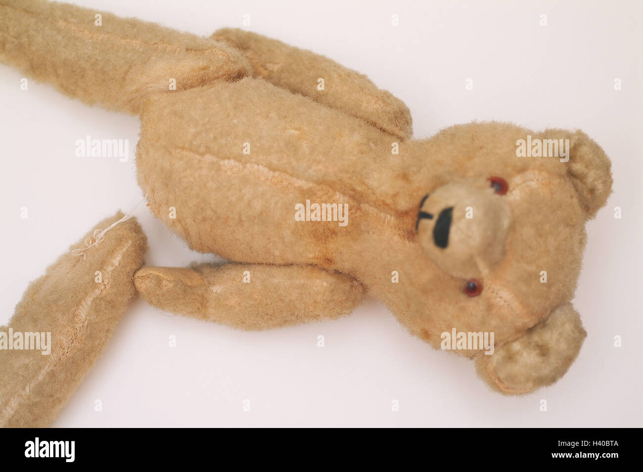 Soft toy, teddy bear, broken, bone loose, toys, soft animal, nonsense animal, soft toy, Teddy, Stoffteddy bear, nostalgically, old, uses, worn-out, discarded, forget, lie, foot laxly, hang away, damage, defective, defectively, broken, ruins, recollection, Stock Photo