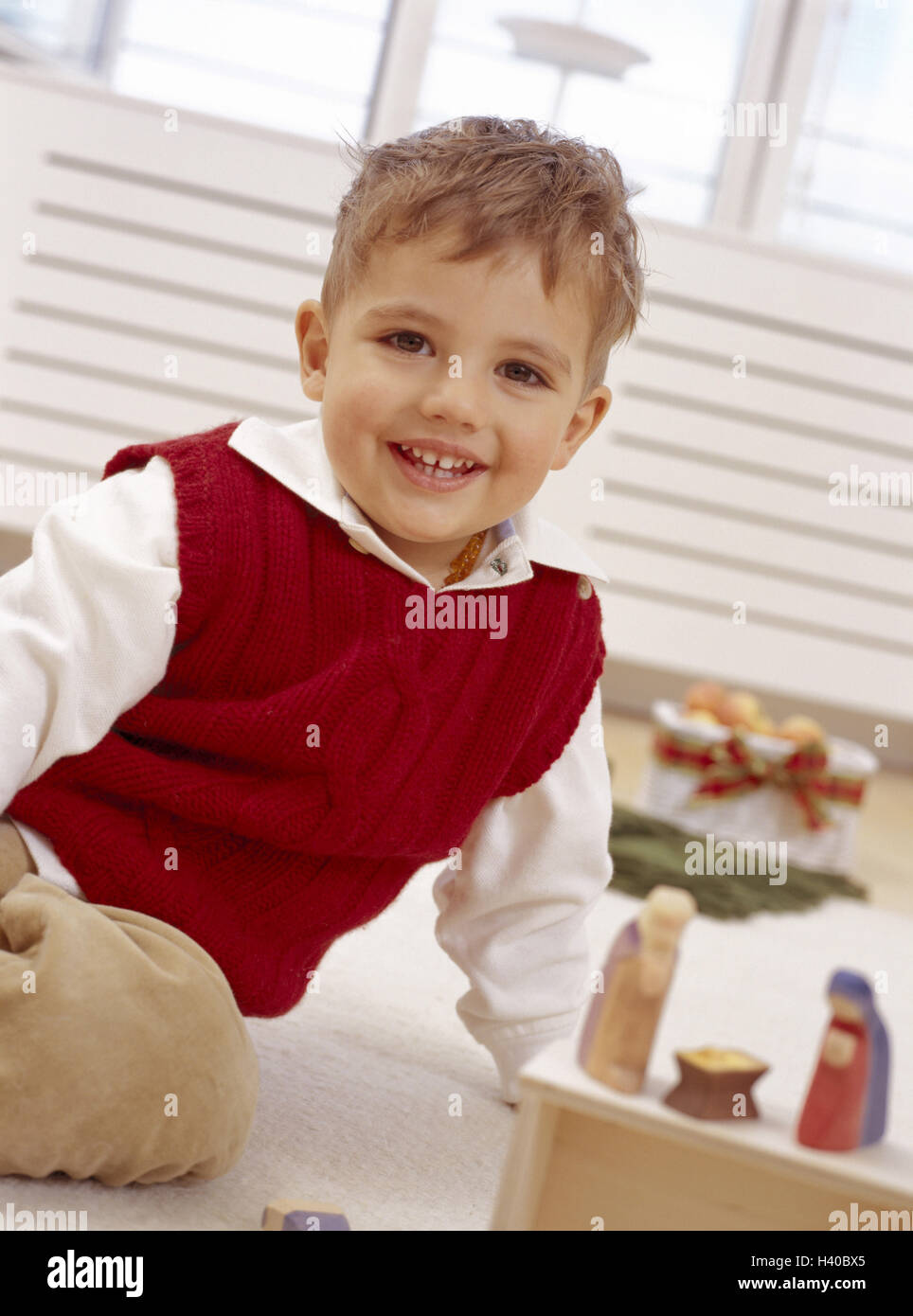 Christmas, floor, boy, nativity figurines, plays, yule tide, Advent season, Advent, child, infant, childhood, lighthearted, natural, happily, amusements, fun, characters, Wooden characters, game, activity, inside, for Christmas, prejoy Stock Photo