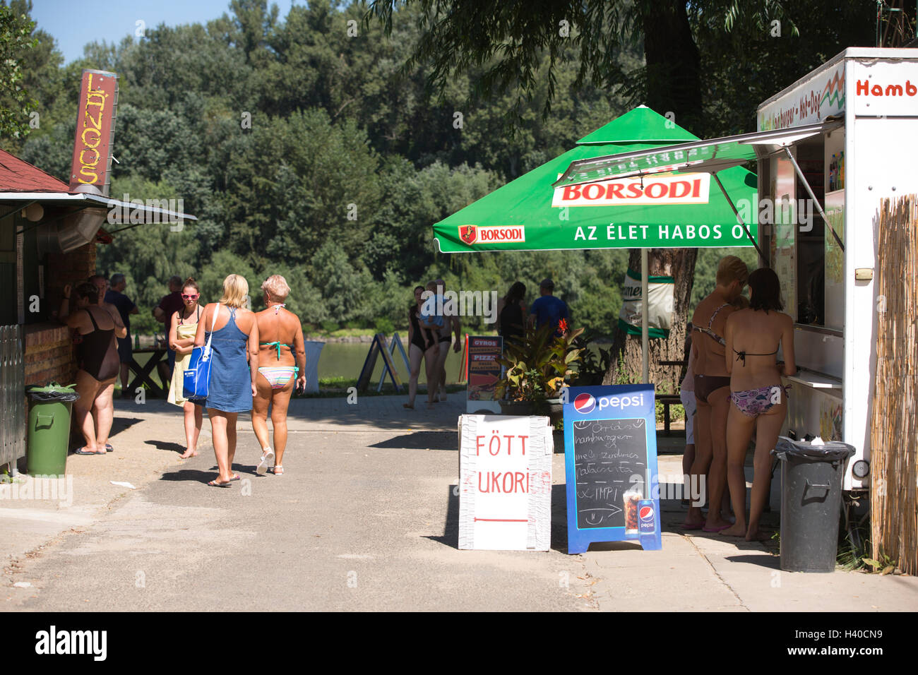Hungarians enjoying the summer temperatures at Koros Torok sandy beach along the River Tisza, Csongrád, Hungary Stock Photo