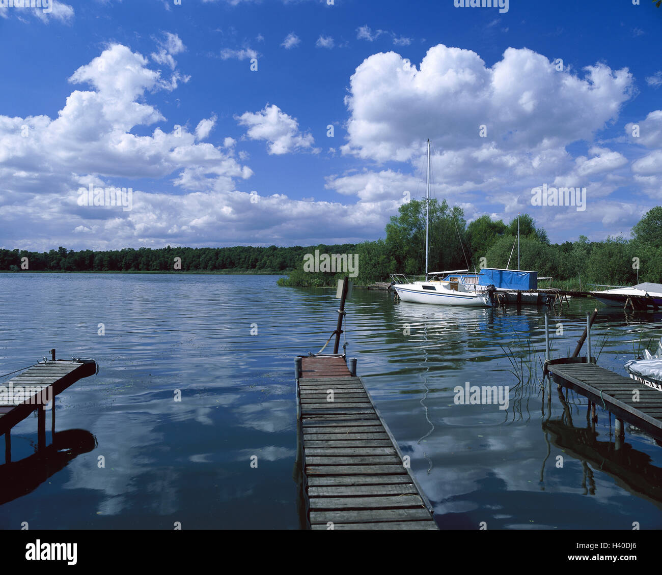 Germany, Brandenburg, crust moor, skirmish lake, wooden jetty, boots, Europe, Ruppiner country, recreation area, lake, bridges, landing stages, sailboats, heavens, clouds, cloudy skies Stock Photo