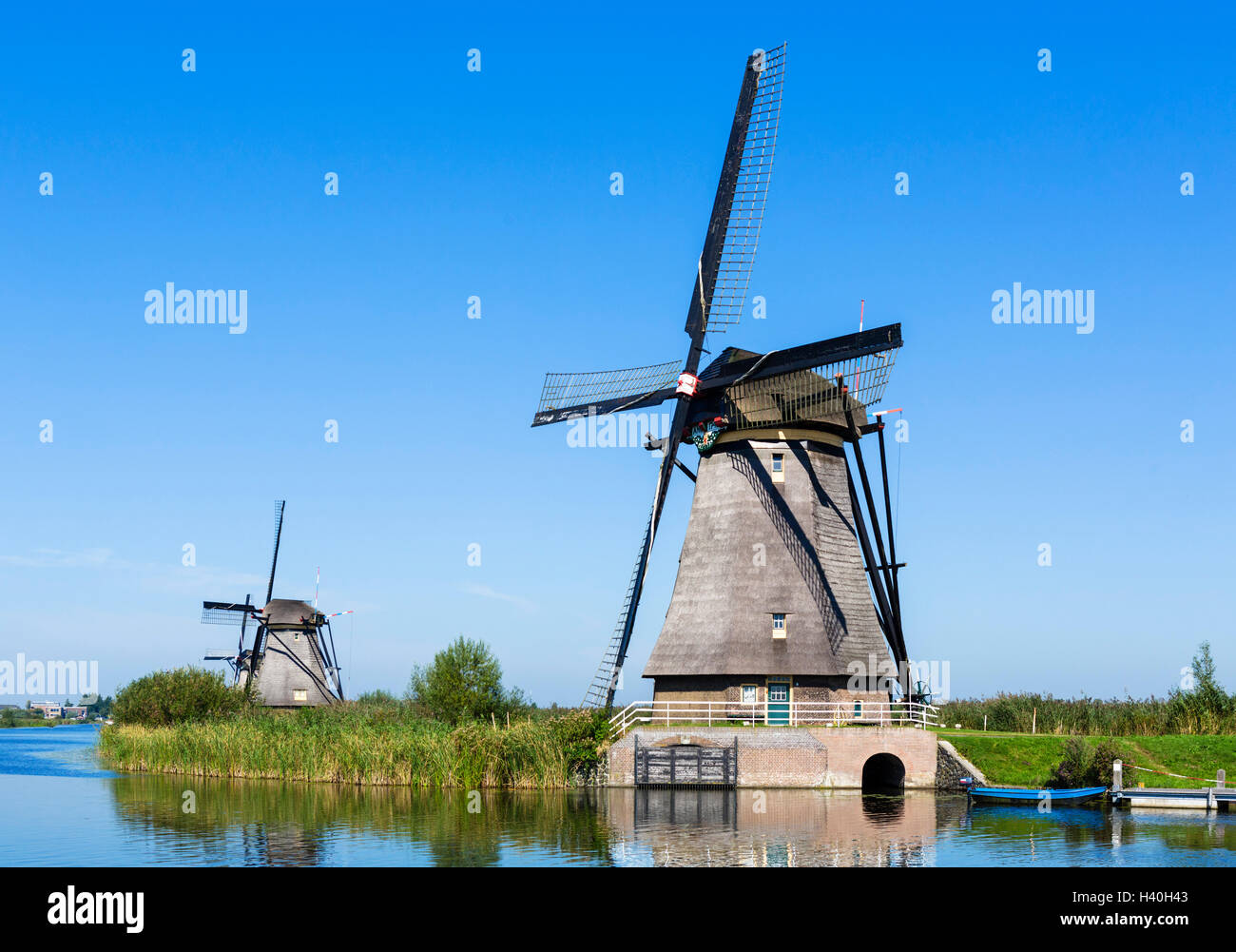 Historic windmills at Kinderdijk, Molenwaard, near Rotterdam, Netherlands Stock Photo