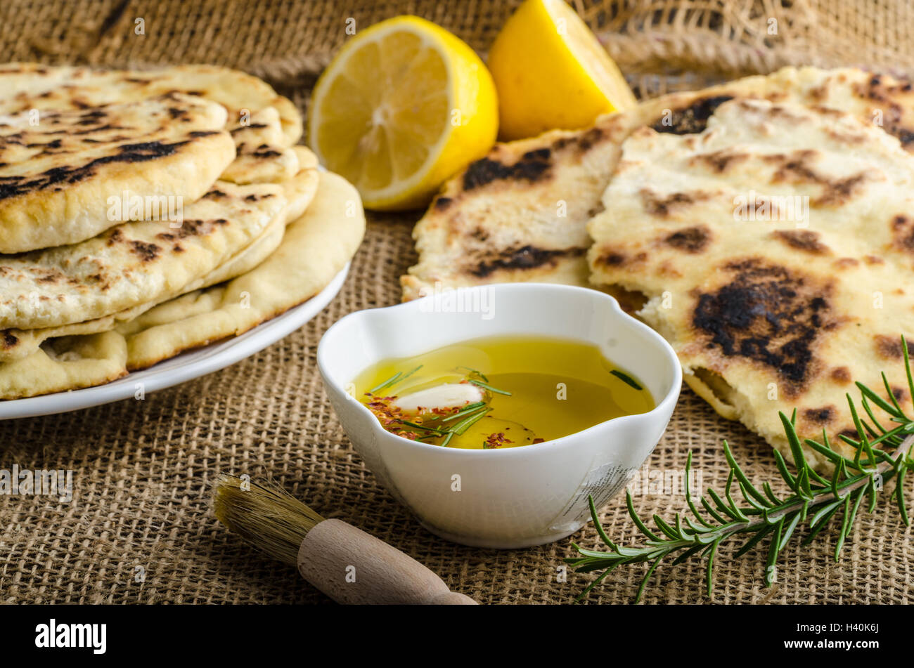 Indian bread with rosemary, garlic and olive oil Stock Photo Alamy