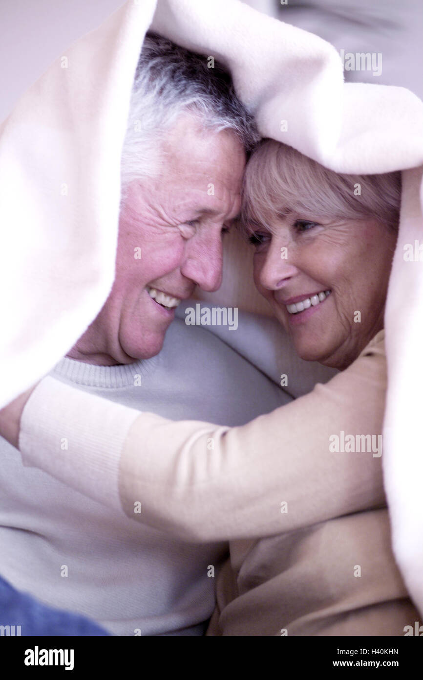 Senior citizen's couple, ceiling, cuddle, joke, take it easy happily, happily, détente, eye contact, affectionately, couple, senior citizens, old person, 60-70 years, Best of all Age, love, partnership, affection, allowance, tenderness, suture, luck, fun, touch, feeling, lighthearted, enjoy, together, security, harmony, closeness, cover, suture, heat, lifestyle, Stock Photo