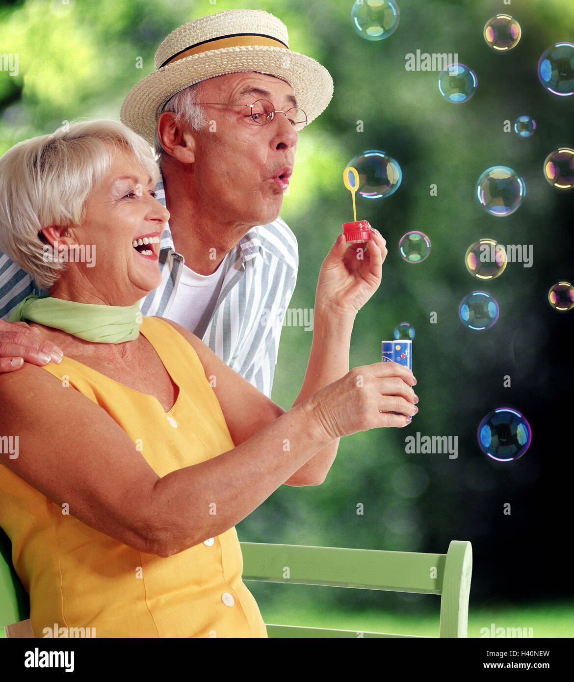 Senior Couple Park Bench Soap Bubbles Game Fun Summer Senior