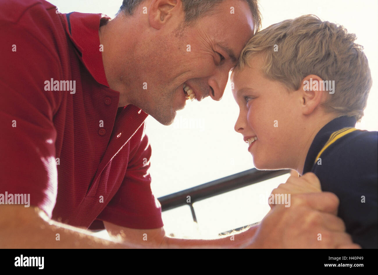Father son smile forehead hi-res stock photography and images - Alamy