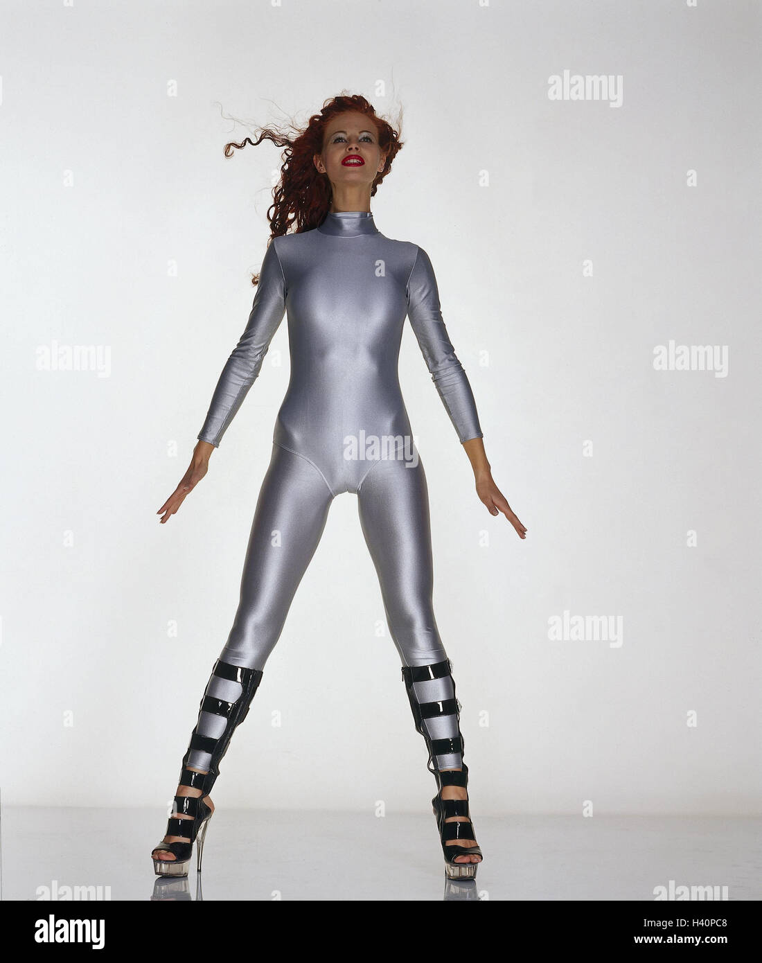 A woman in futuristic clothes stock photo - OFFSET