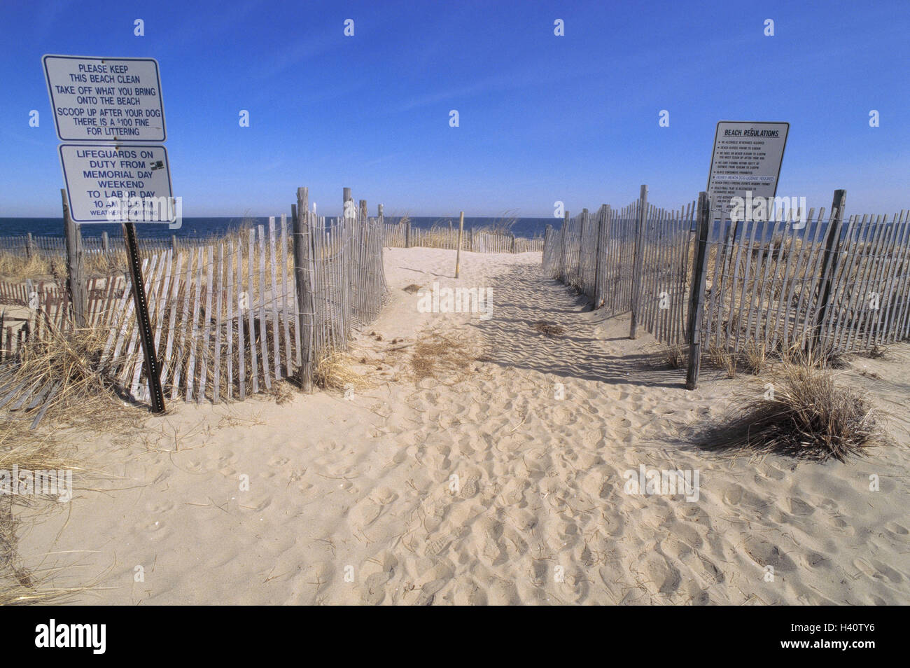 The USA, Florida, golf Mexico, Naples, sandy beach, fence, signs, America, beach, enclosure, wooden fence, signs, information, attention, information signs, beach rules, tips Stock Photo