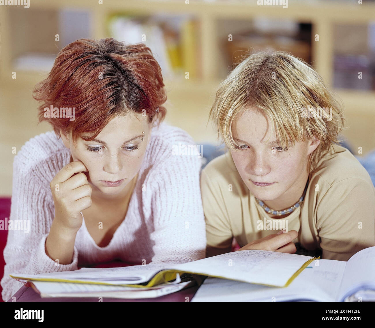 Friends Floor Lie Learn Bases Model Released Inside At Home Stock Photo Alamy