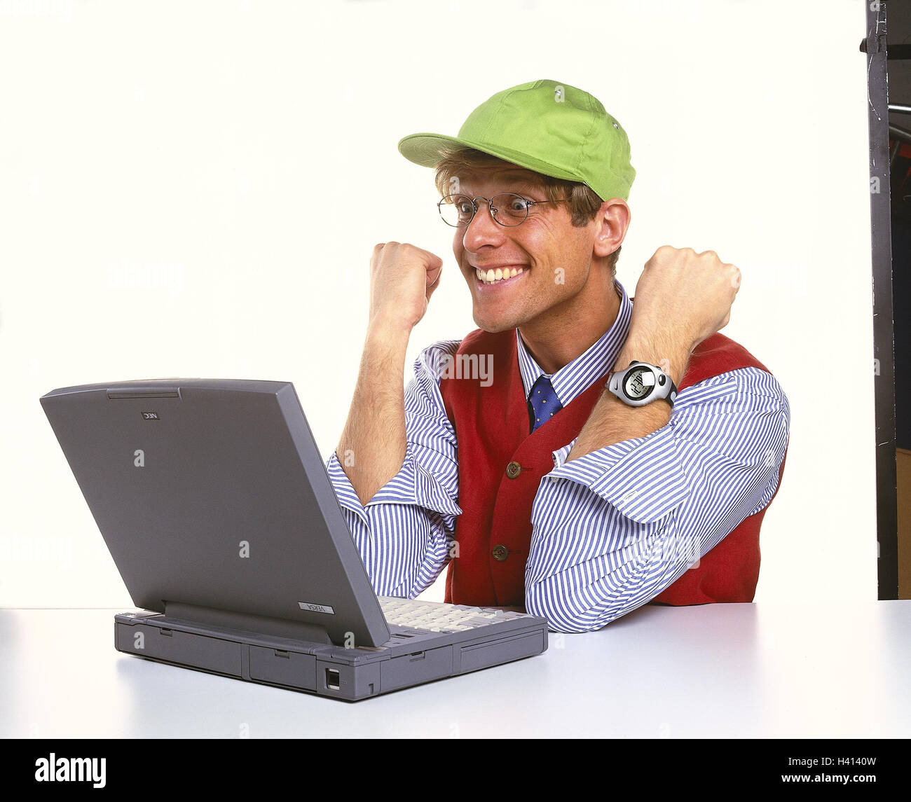 Man, glasses, sign cap, laptop, gesture, success, cheering Men, computer, notebook computer, data processing, work, work, laugh, happy, sense achievement, joy, rejoice, enthusiasm, result, positively, triumph, studio, Stock Photo