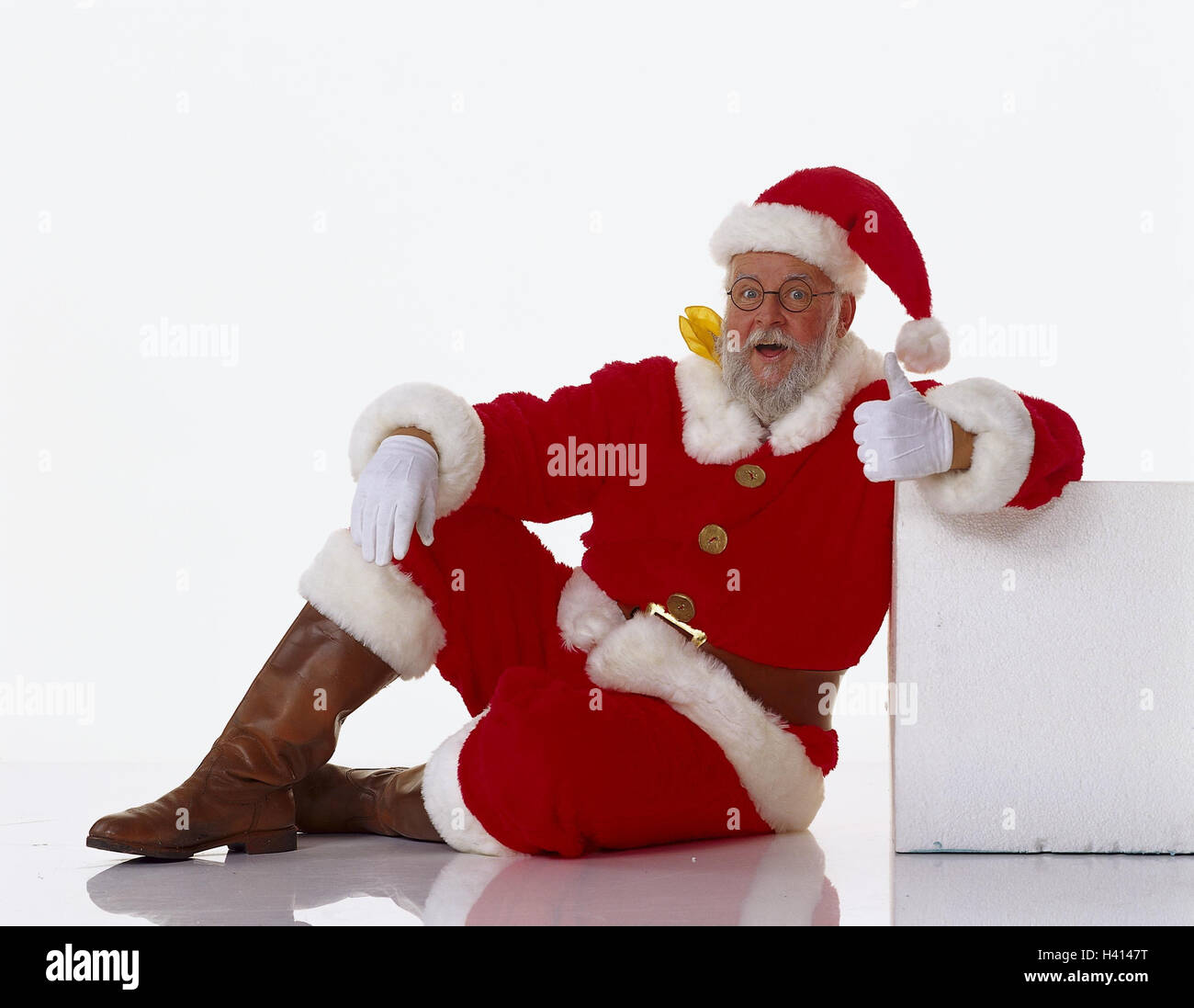 Santa Claus, facial play, smile, sit, gesture, pollex, high X-mas, Christmas, Santa, glasses, neckerchief, feet, high, rest, relax, break, rest Stock Photo