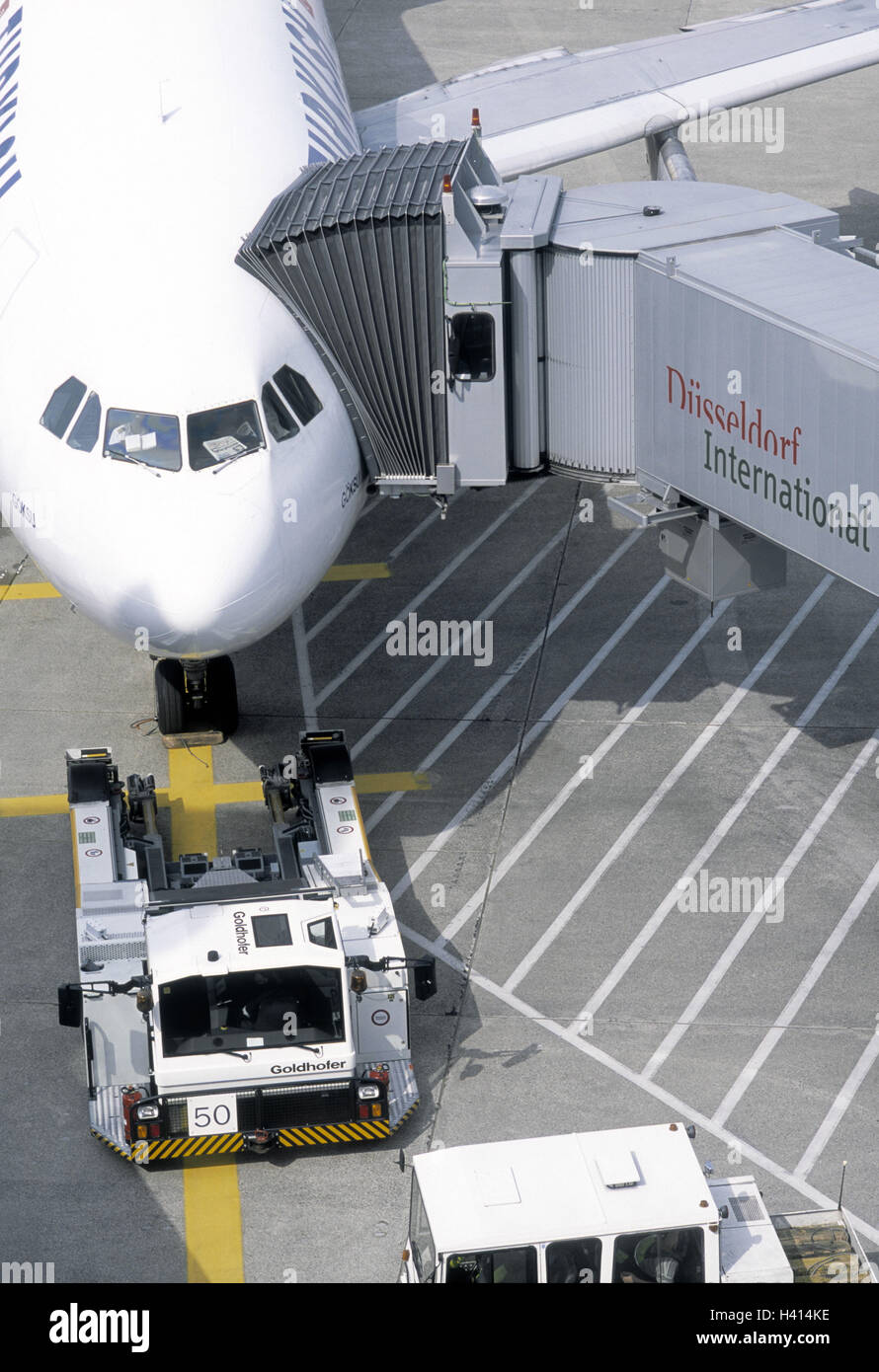 Germany, North Rhine-Westphalia, Dusseldorf, airport, landing field, gangway, passenger plane, detail, cars, Europe, town, state capital, airplane, air liner, traffic, aviation, air traffic, air traffic, transport, personal transport, passenger traffic, t Stock Photo