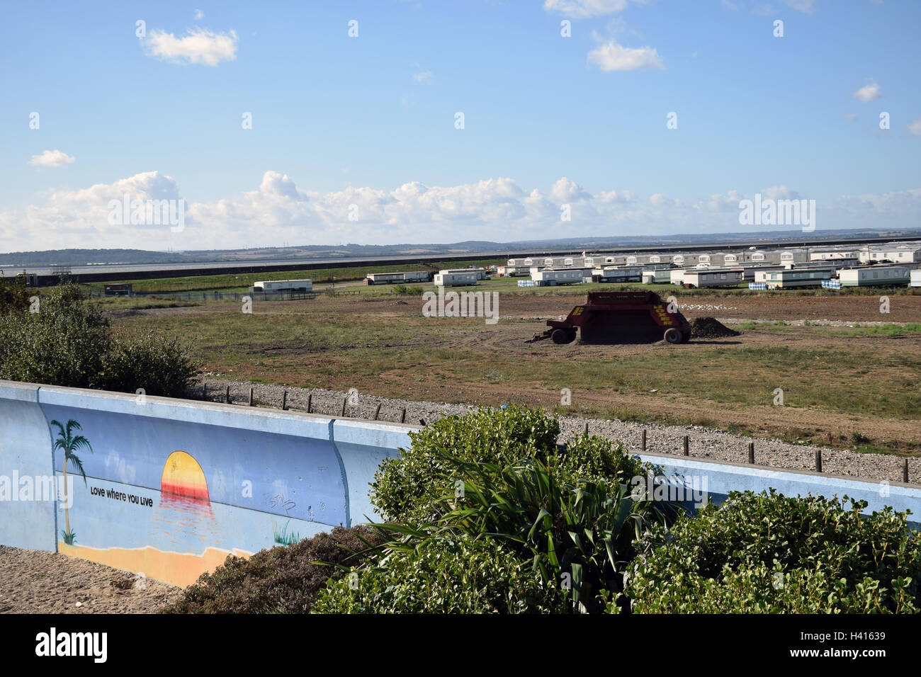 Canvey Island, Essex UK - holiday village with flood protection wall Stock Photo