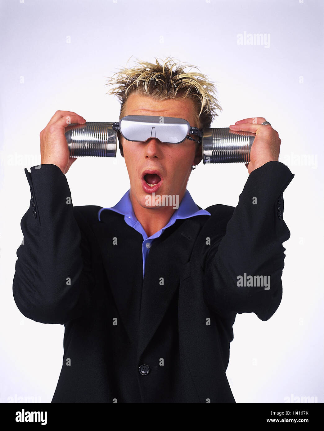 Cyberspace, man, young, glasses, tins, ears, hold, facial play, half portrait, concepts, selftinkered, virtual reality, communication, technology age, studio, cut out, 'Do-it-yourself' Stock Photo