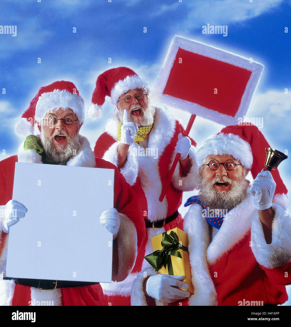 Santas, advertising media, present, bell, gesture, joy, enthusiasm Composing, studio, cloudy sky, Christmas, Christmas, Santa Claus, Santa, men, signs, win over, advertisement, presentation, attention, esteem Stock Photo