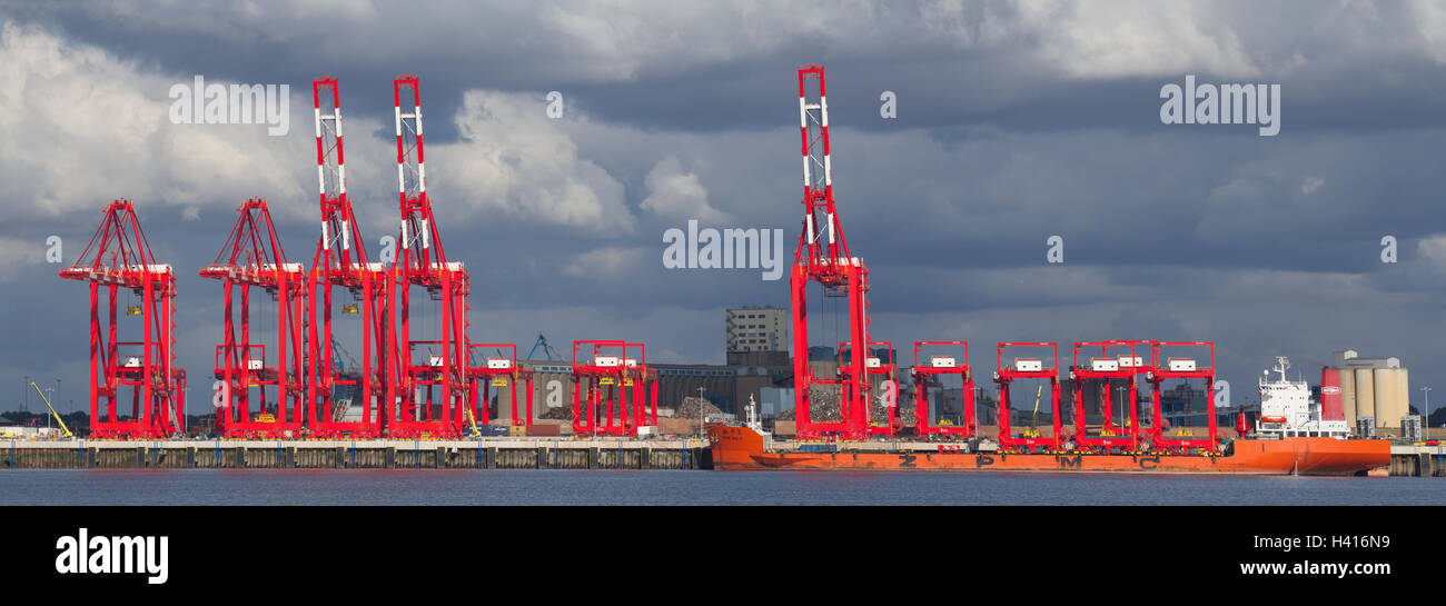 Operational cantilever rail-mounted gantry (CRMG) cranes; Chinese Steel Container Cranes arrive at Seaforth. The China vessel Zhen Hua 8 delivers the second batch of huge operational cantilever rail-mounted gantry dock crane to be assembled in the expanding Liverpool 2 Seaforth container port. Merseyside, UK Stock Photo