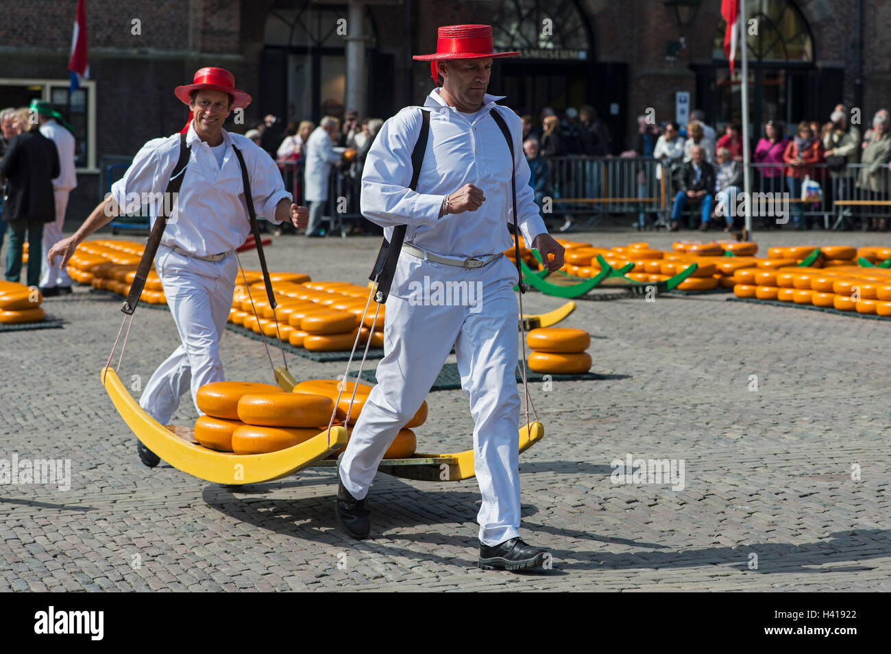 Cheese carriers at work, rituals and traditions of cheese trading presented at the cheese market of Alkmaar, Netherlands Stock Photo
