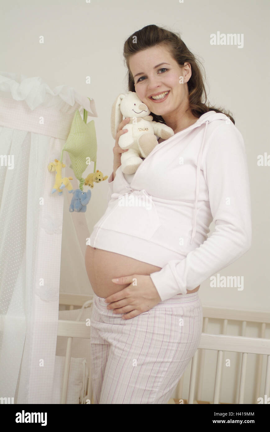 Cot, woman, pregnant, soft toy, hand, abdomen, touch, dreams away