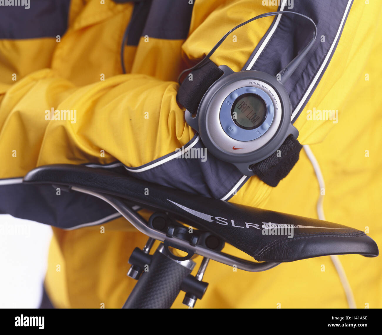 Mountain biker, detail, MP3 player, waterproof, hobby, leisure time, sport, sportsman, fun, fitness, equipment, accessories, equipment, Portably sport audio by Philips, player MP3, waterproof, mark Nike, consumer electronics, riding of a bike, bicycle driving, biking, Mountainbiken, motion, activity, sportily, leisure time sport Stock Photo