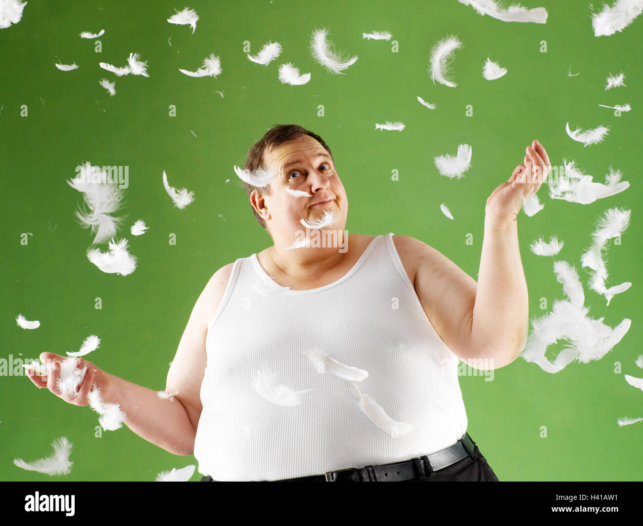 Man, vest, half portrait, feathers, fall down middle old person, happy, gesture, thickly, bold, overweight, fat, fatly, adiposity, obesity, obesity, voluminously, seriously, body weight, weight, contrast, contrast, difference, down feathers, downs, small, Stock Photo