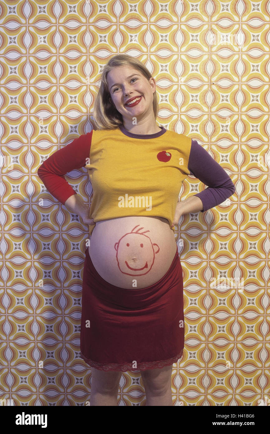 Pregnant, bare midriff, paints, inside, woman, young, Pregnant, gestation, Gestation, gestation, abdomen, painted, look, funnily, humor, cheerfully, cheerfulness, happy, expression, Stock Photo