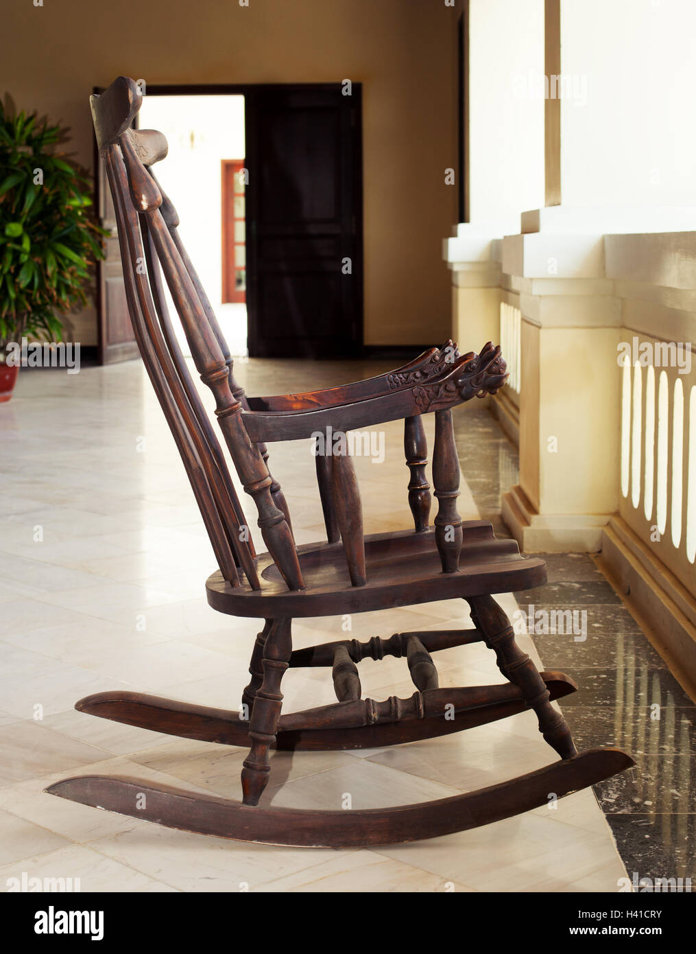 Rocking chair asian, wooden art the hotel lobby Stock Photo - Alamy