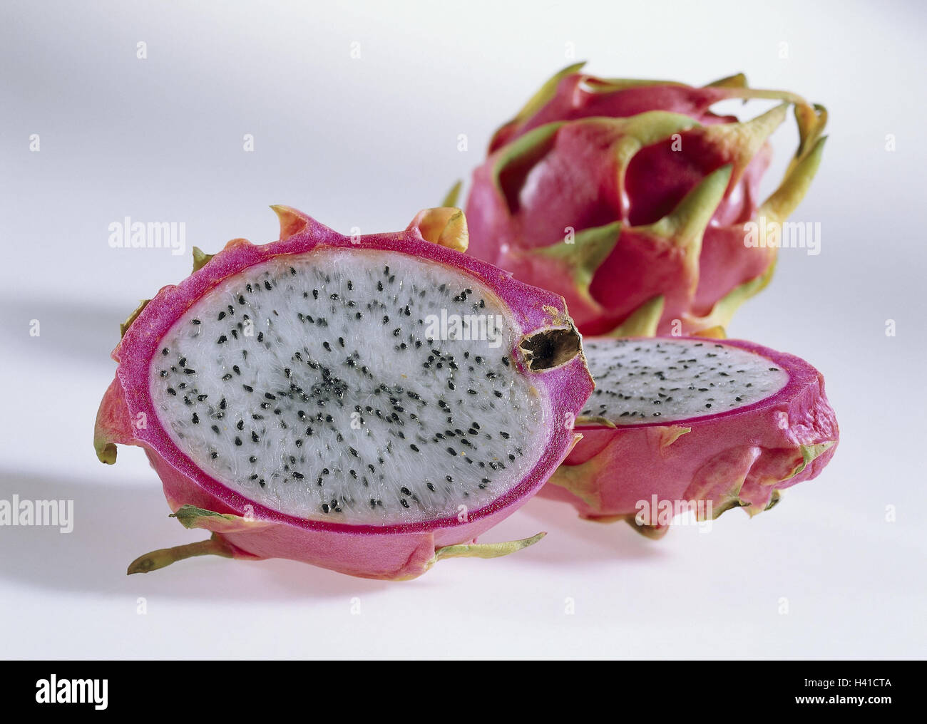 Red Pitahaya, completely, cut open, Still life, fruits, exotic, tropical, tropical fruits, Pitaya, Hylocereus triangularis, cactus plants, cactus fruits, nutrition, healthy, rich in vitamins, vitamins, prickly pear, Opuntia ficus india, flesh Stock Photo