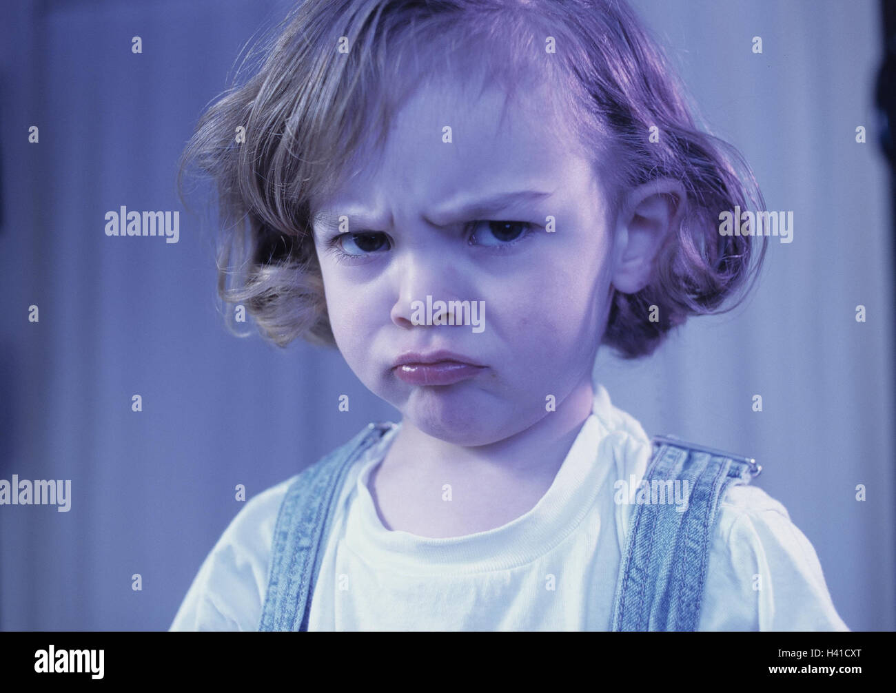 Girls, dissatisfied, facial play, portrait, inside, child, 5 years, discontent, grimace, childhood, furiously, fury, angrily, rage, mood, negatively, expression, sulk Stock Photo