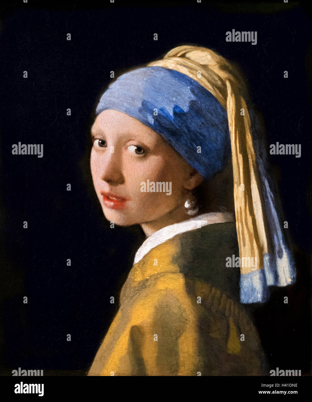 Johannes Vermeer, Girl with a Pearl Earring (Meisje met de parel), oil on canvas, c.1665. Painting on display in the Mauritshuis, The Hague, Netherlands. Stock Photo