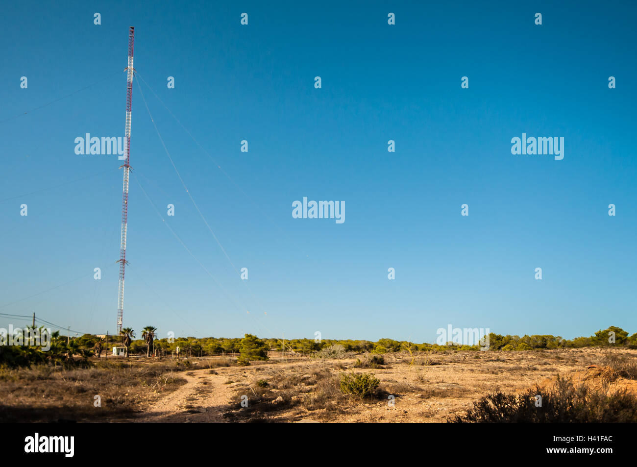 Torreta de Guardamar is a 370m tall guyed radio mast erected by the US Navy near Guardamar del Segura, Spain, Europe. Tallest structure in EU. Tower Stock Photo
