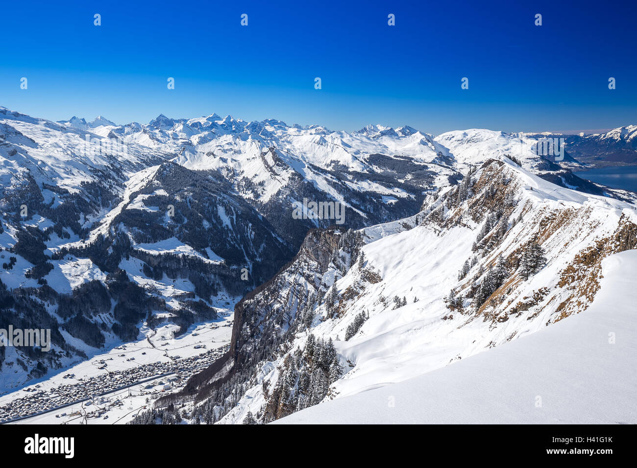 Muotathal valley and Lake Lucerne surrounded by Swiss Alps seen from Hoch Ybrig ski resort, Schwyz, Central Switzerland Stock Photo