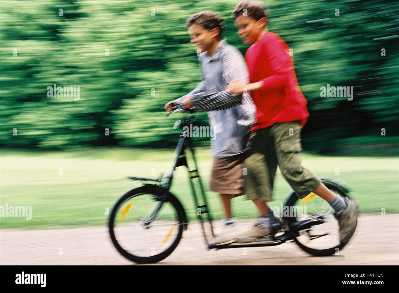 Boys, scooters, motion blur, youth, childhood, children, friends, two, game, fun, leisure time, scooter go, scooter driving, together, summer, outside, blur Stock Photo