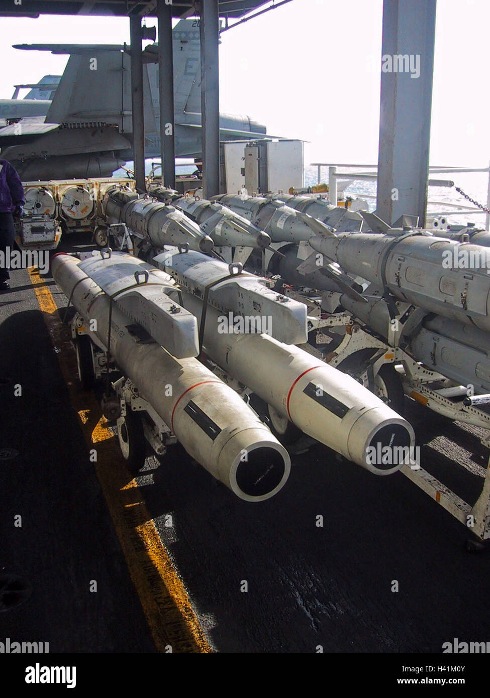 3rd February 2003 During Operation Enduring Freedom, bombs on trolleys on the USS Constellation (CV-64) in the Persian Gulf. Stock Photo