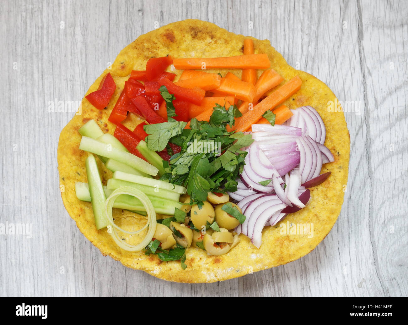 Socca cake with chickpea flour with vegetables Stock Photo Alamy
