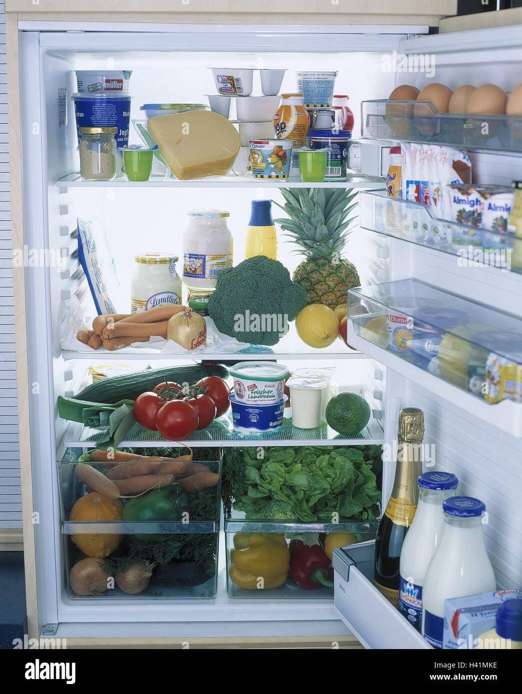 Fridge, openly, completely, food household appliance, electrically, storage, foods, food, eat, retention, stock, stocks, durability, cooling, keeps, milk, milk products, vegetables, tropical fruits, abundance, food, product photography, Still life Stock Photo