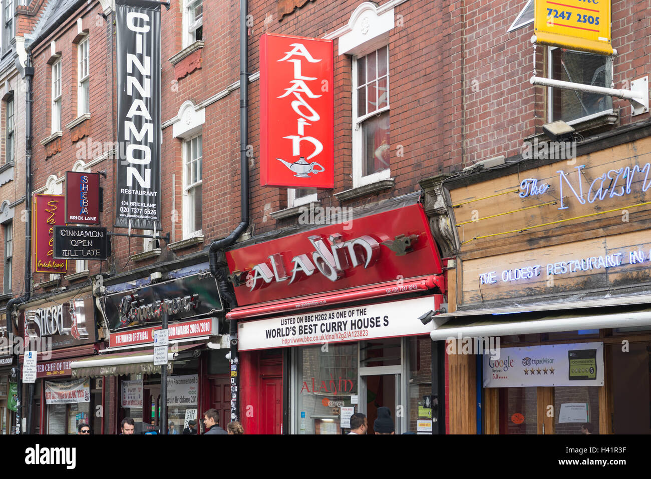 Colourful restaurant signs  in Brick Lane, London Stock Photo