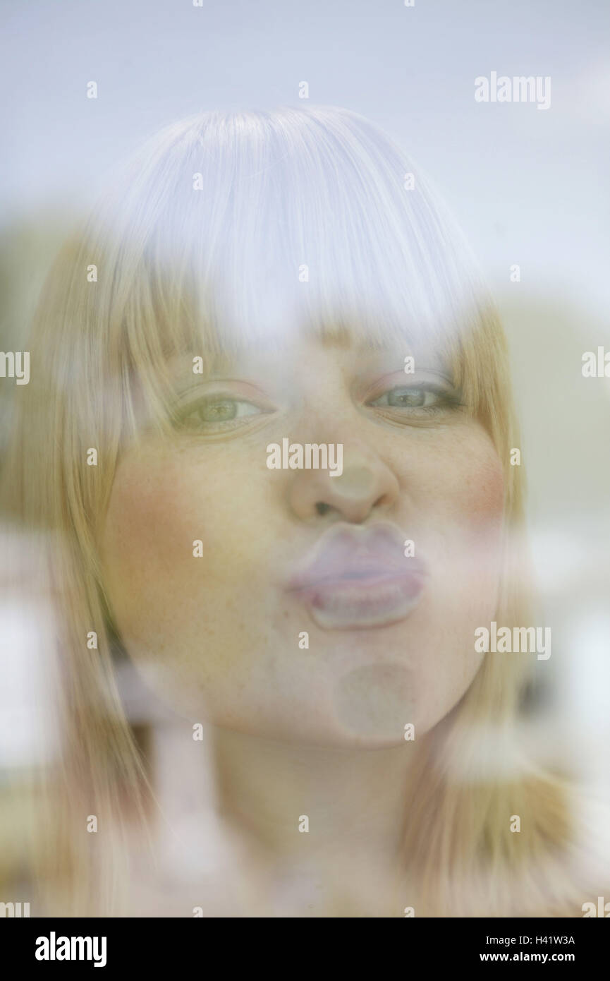 Woman, young, joke, window pane, kiss mouth, to level pressures, portrait, blond, 20-30 years, windowpane, horse around, flatten fun, amusement, joke, humor, stupidly, window, glass, look, nose, lips, flatly, flattened, decagram gene pressing, slice, transparency, transparently, facial play, happy, melted, inside Stock Photo