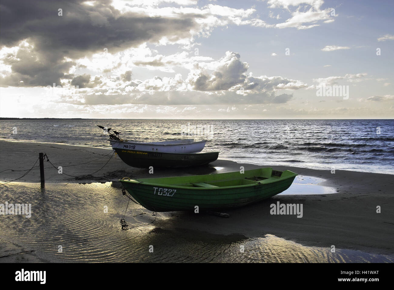 Beach, sea, ebb, boats, heavens,  Clouds, back light,  Series, cloud heavens, cloudy, clouds thunderclouds horizon boundlessly nature, landscape, loneliness, isolation, sandy beach, water, coast landscape, fisher boats, rowboats, concept, outlook, distance, wideness, mood, cloud mood, mood-full Stock Photo