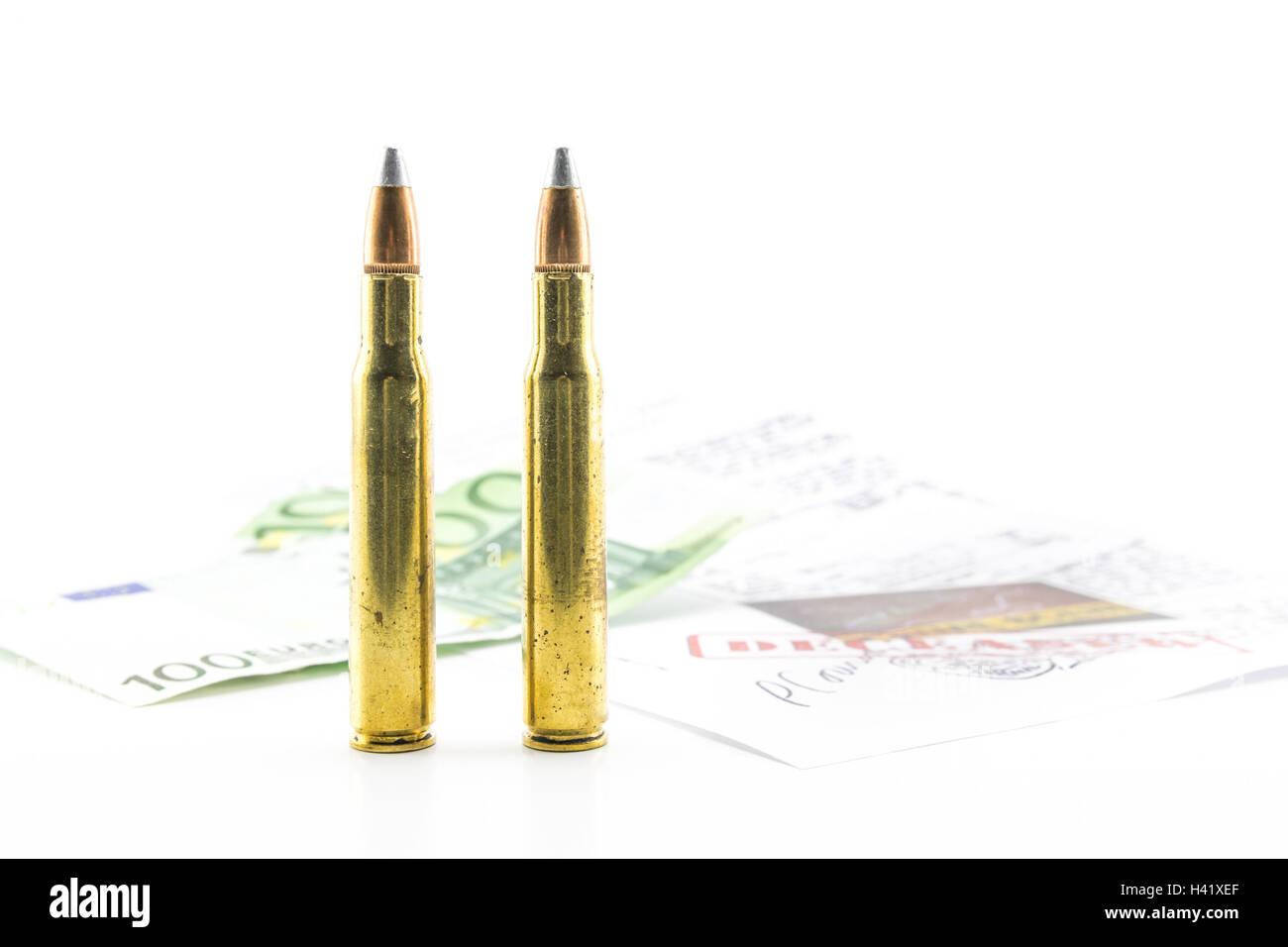 composition with bullets, money and documents of the investigation Stock Photo